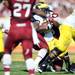 Michigan running back Vincent Smith is wrapped up by a South Carolina defender in the second quarter of the Outback Bowl at Raymond James Stadium in Tampa, Fla. on Tuesday, Jan. 1. Melanie Maxwell I AnnArbor.com
